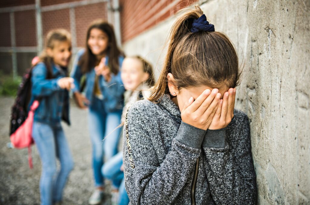 A kid bullying by their classmate.